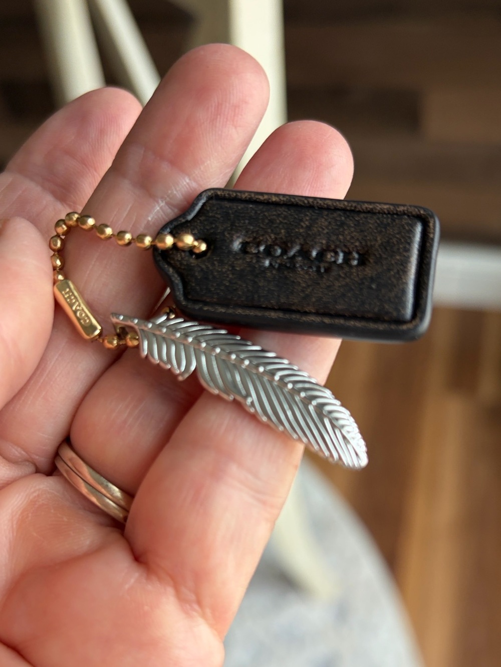 Coach Black Leather Tag Keychain with Gold Ball Chain and Silver Feather Charm